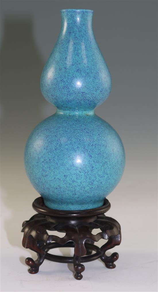 A Chinese robins egg glazed double gourd vase, late 18th century, 15.5cm, wood stand